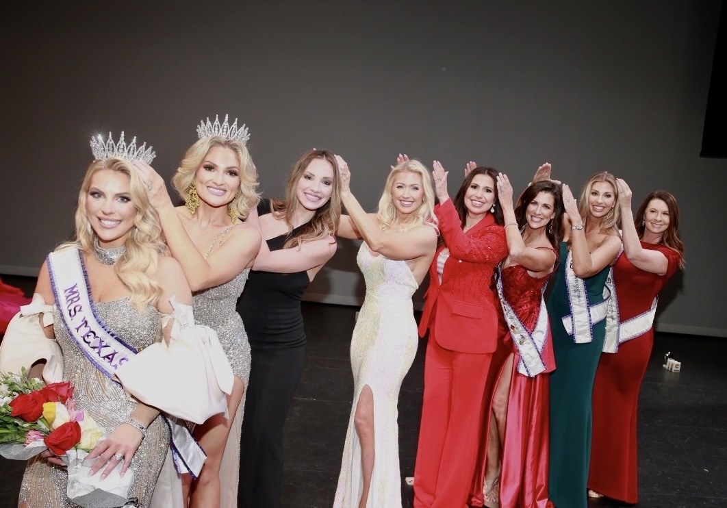 Titleholders celebrating together after crowning